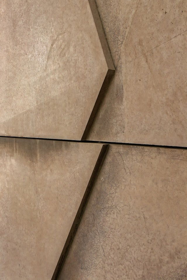 A customer comparing tile samples